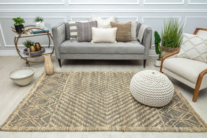 Natural woven area rug with a geometric pattern, perfect for enhancing modern living room decor.