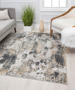 Modern abstract area rug with black, beige, and white tones, adding a contemporary touch to any living room decor.