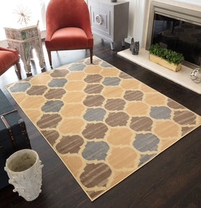 Cozy living room with a yellow, brown, and gray geometric patterned rug, red armchairs, and a fireplace creating a warm and inviting atmosphere