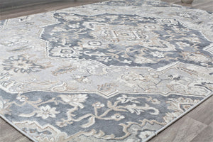  Close-up view of a gray and white traditional pattern rug, showcasing intricate floral designs.