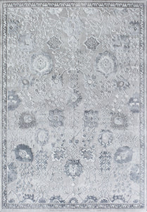 Top view of a gray area rug with intricate floral patterns and border design, suitable for adding elegance to any room.