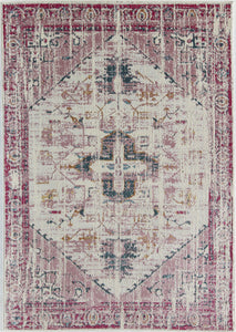 Full view of an antique rose area rug with intricate patterns.