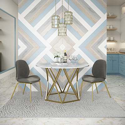 Dining area with a white textured rug, stylish furniture, and geometric wall design.