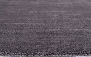 Close-up of gunmetal area rug showing fine textured details and durable craftsmanship.