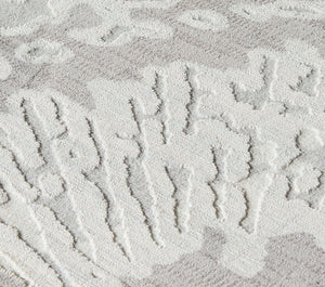 Close-up texture view of Boho grey area rug with abstract patterns.