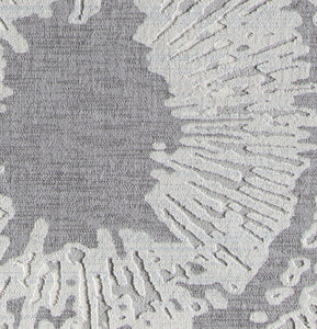 Detailed close-up of Boho grey area rug with abstract patterns.