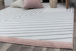 Close-up of a modern rug with black geometric lines on a white background and a brown border, perfect for enhancing contemporary home decor.