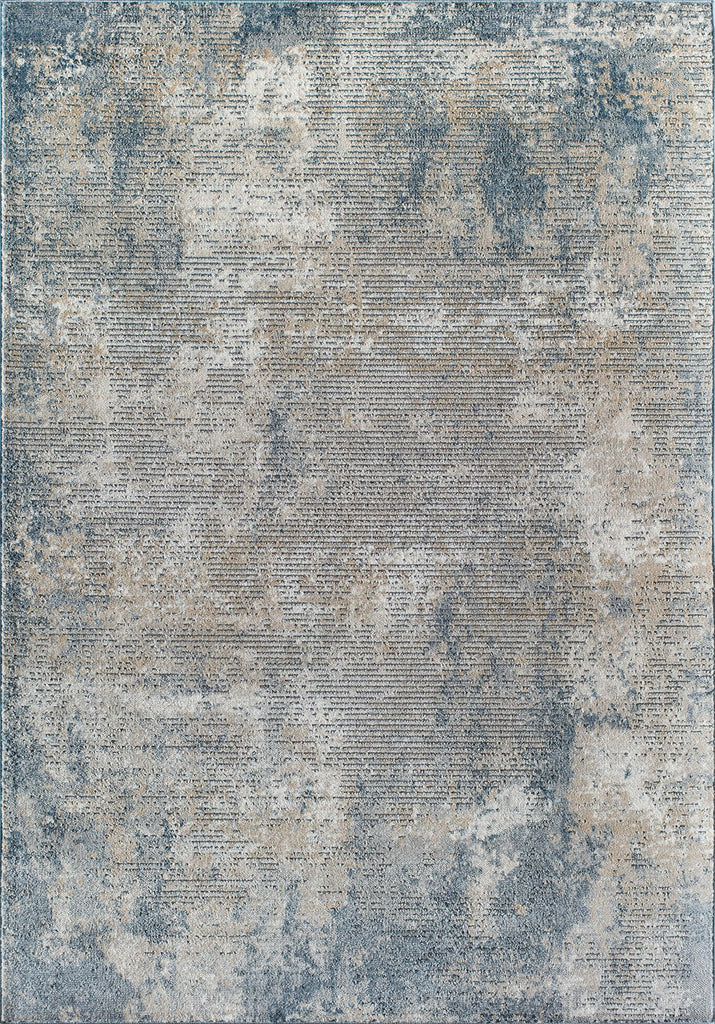 Top view of a distressed blue and beige abstract rug with a vintage, worn-out look.