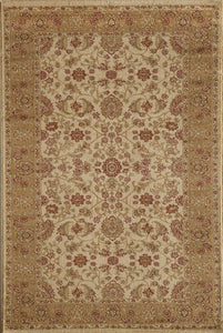 Close-up of a cream area rug with intricate floral patterns.