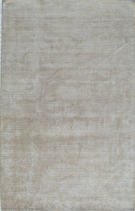 Minimalist beige woven area rug, perfect for adding a subtle and stylish touch to any room.