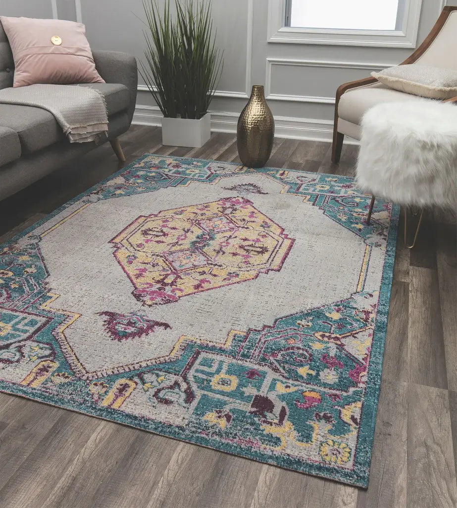 Colorful vintage area rug with intricate patterns and a blue border, adding charm and character to any living room.