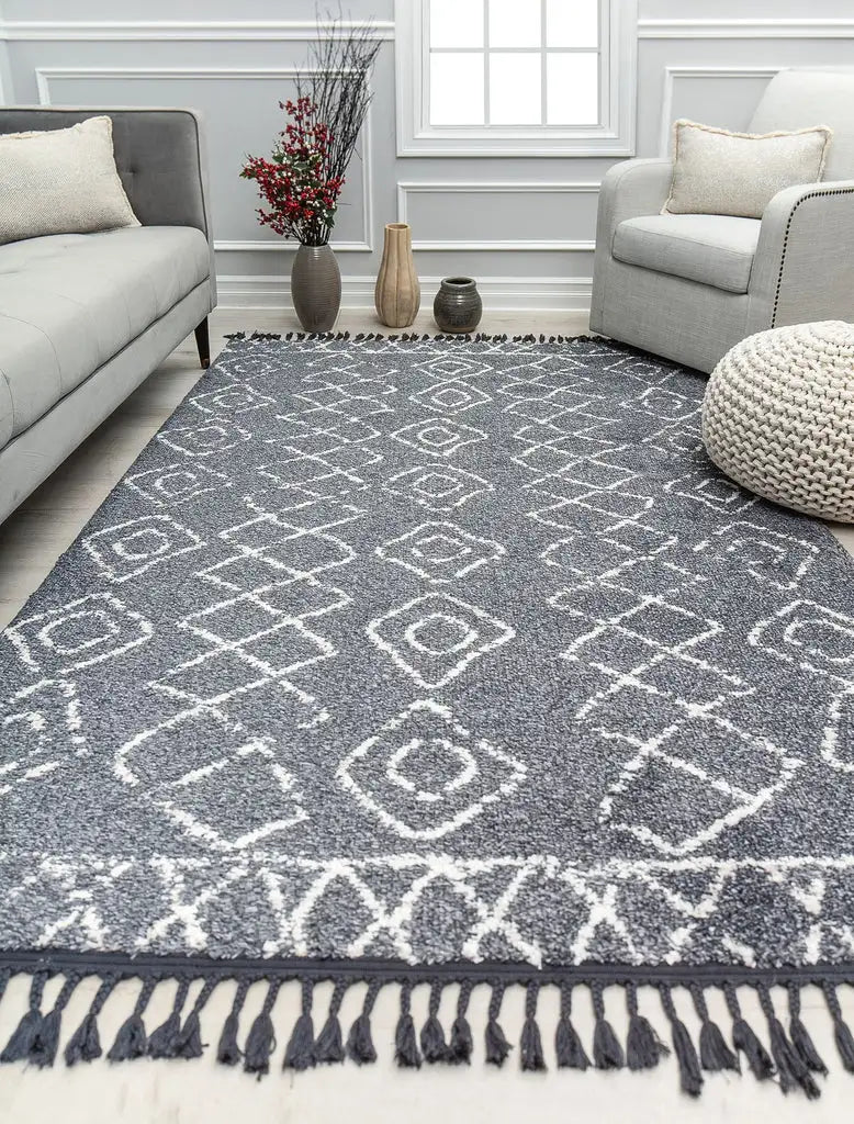 Geometric patterned Ensley rug with green and white tones, enhancing the aesthetics of a contemporary living space.