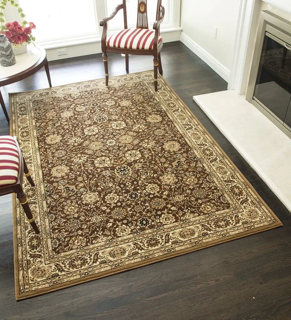 Luxurious brown rug with intricate patterns in an elegant room featuring striped armchairs, a small table with flowers, and a fireplace