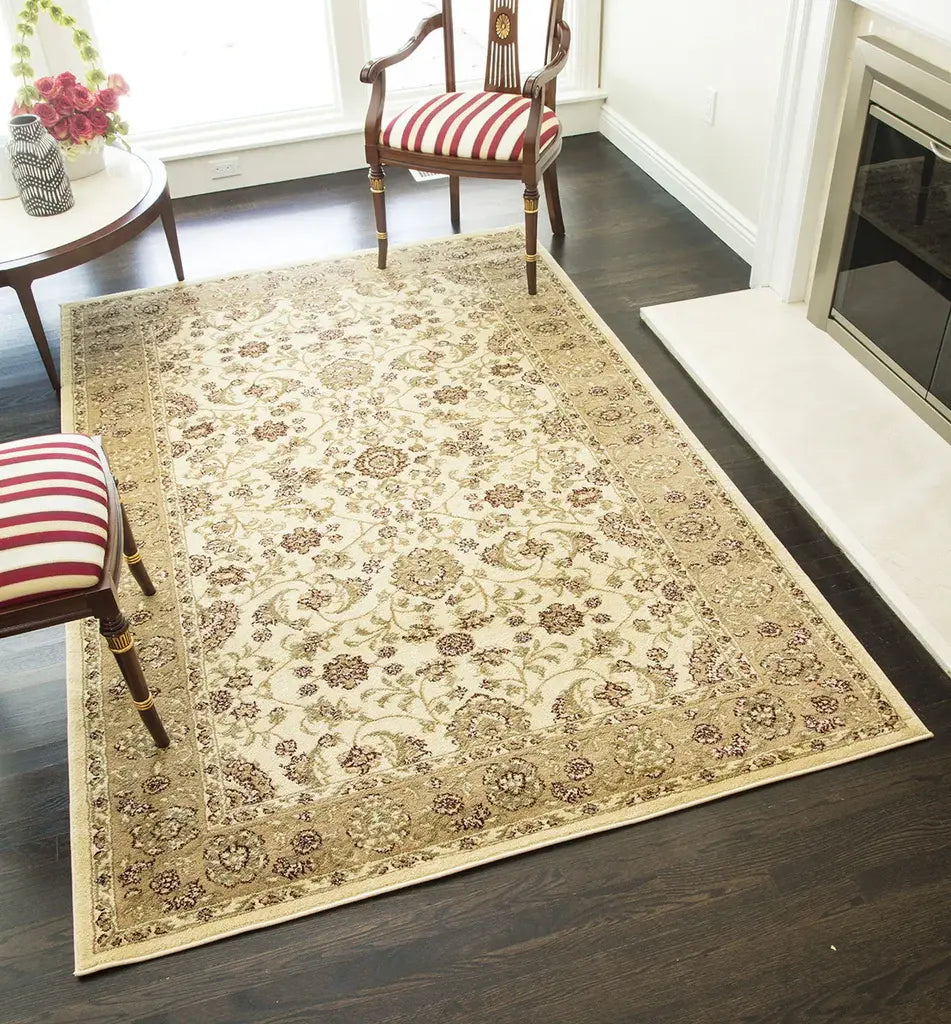 Traditional cream rug with intricate floral patterns in an elegant living room, featuring a striped armchair, fireplace, and side table